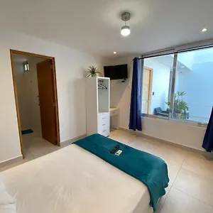 https://arrecife-apartments.quintano-roohotels.com